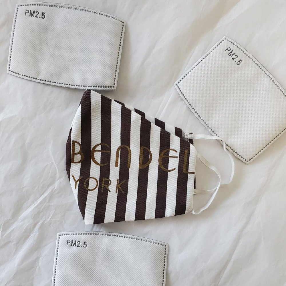 One Henri Bendel Mask with 3 filters included
